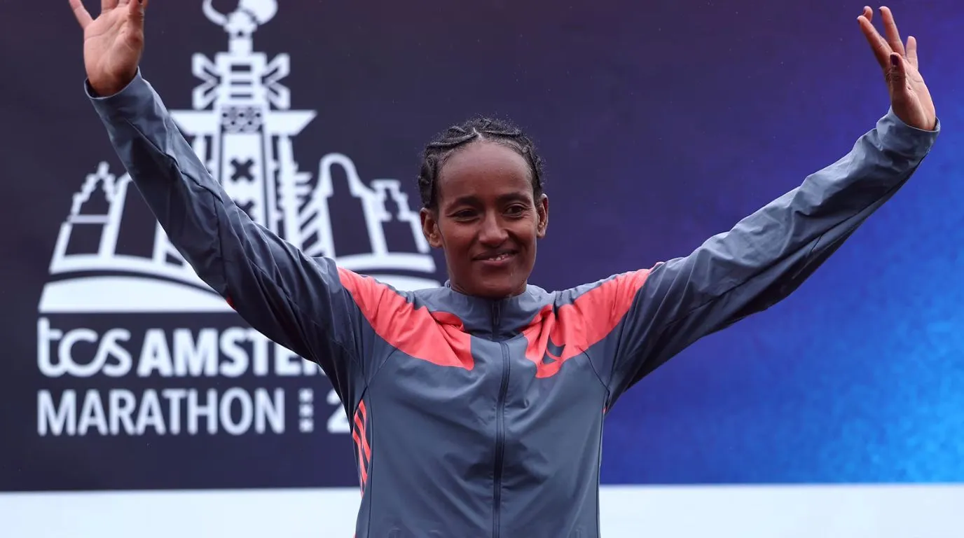 Buze Diriba at the TCS Amsterdam Marathon 2026 award ceremony after winning the women's race in a course record time of 2:16:12.